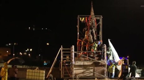 First Green Bridge statue down