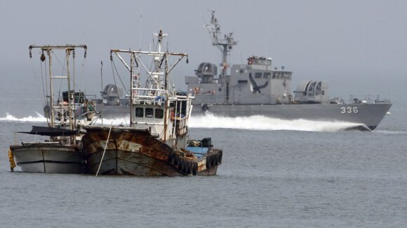 North Korean fishing boats off the South Korean Coast Guard