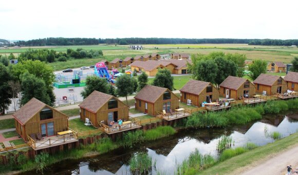 After the noisy Palanga, you will find peace on the banks of the Curonian lagoon: prices, accommodation, entertainment.